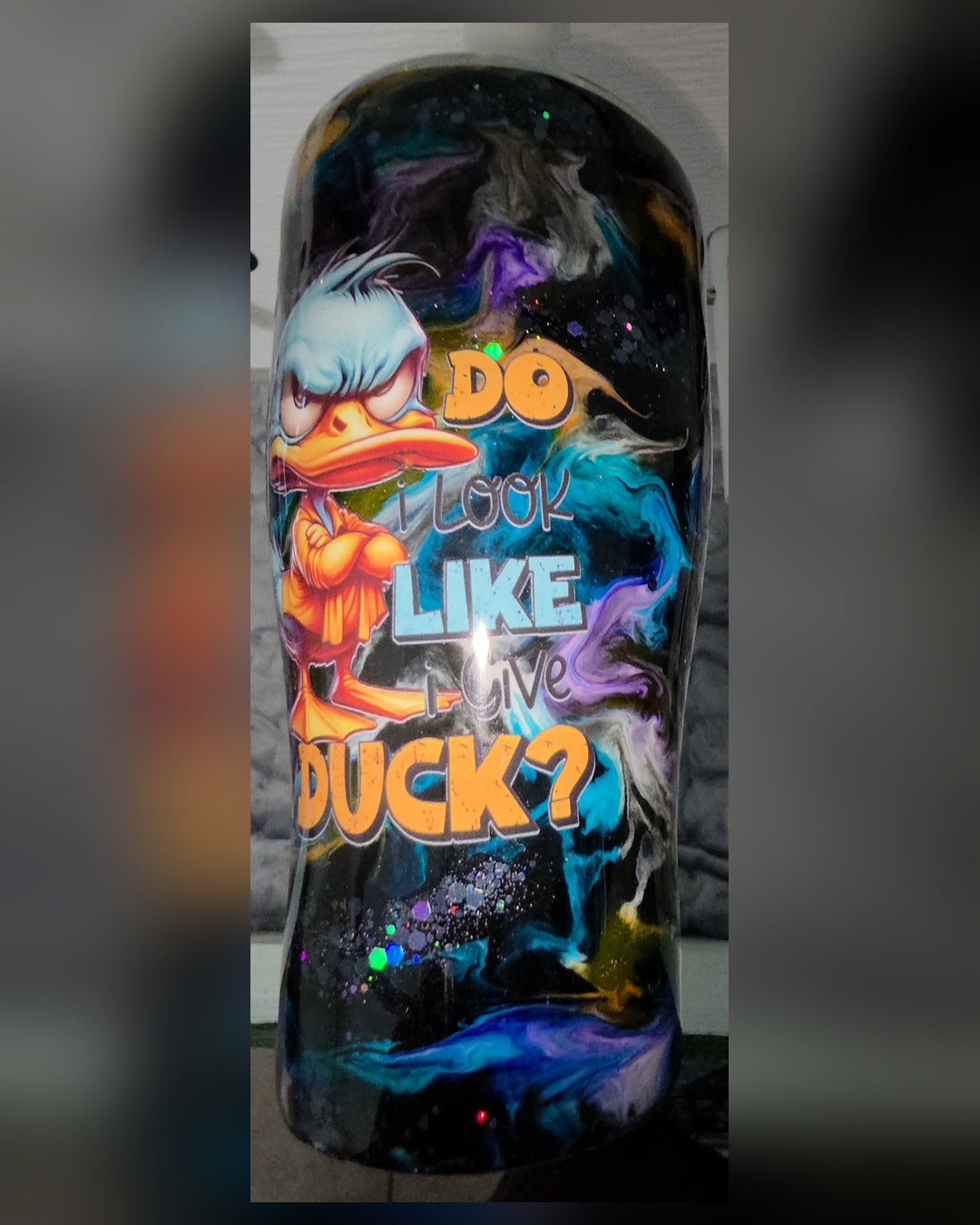 Do I Look Like I Give a Duck 30 oz tumbler with angry duck design on black, blue and purple epoxy swirls