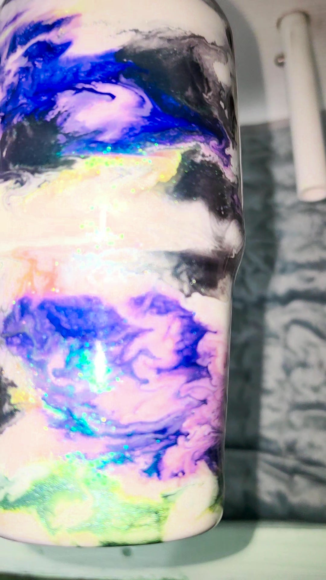 Front of the KrzyPants swirl tumbler in blue, purple, gray and green