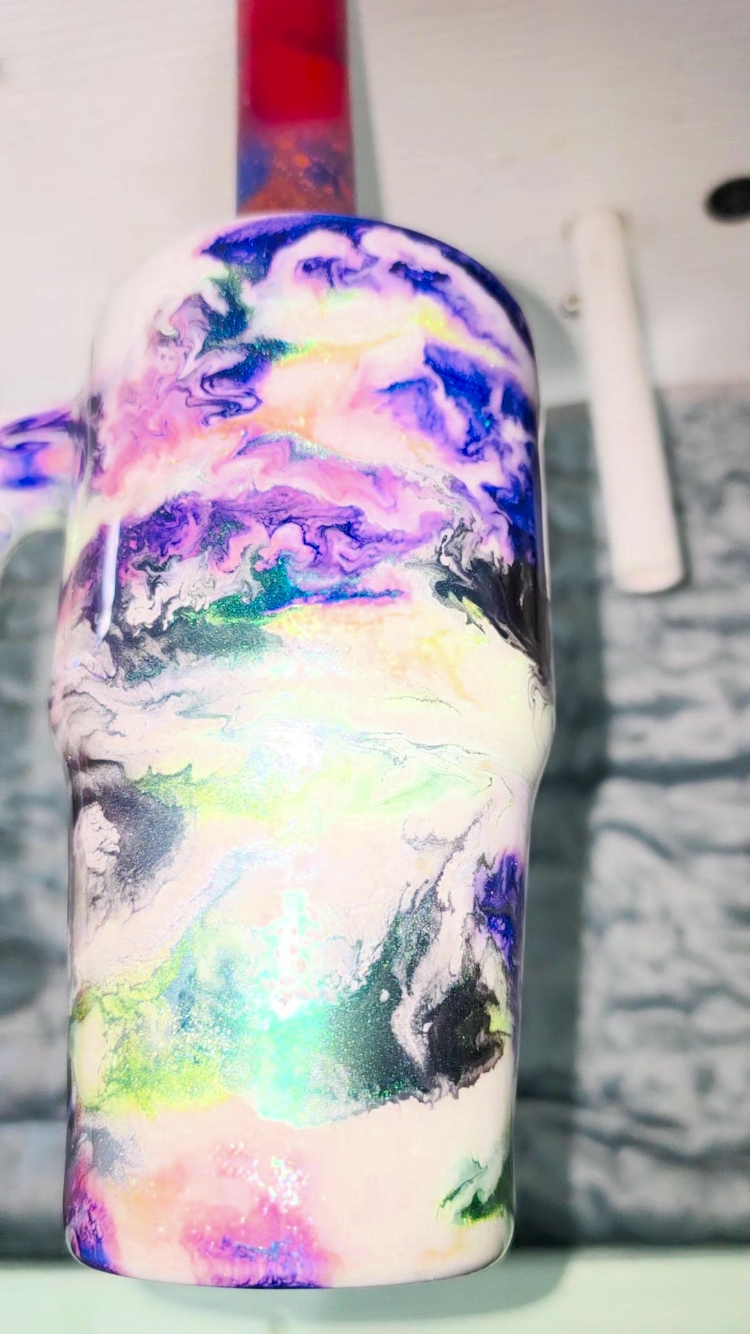 Close-up of the marble swirl and iridescent glitter